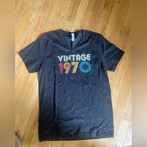 Bella canvas gray t shirt. Says vintage 1970. Size medium